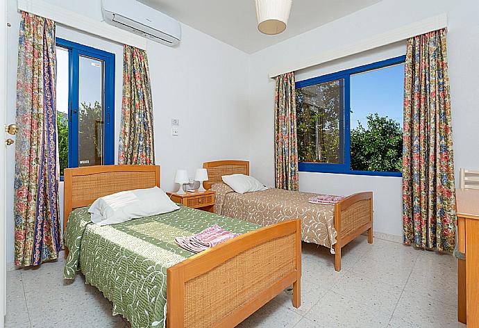 Twin bedroom with A/C . - Villa Charoula Thio . (Photo Gallery) }}