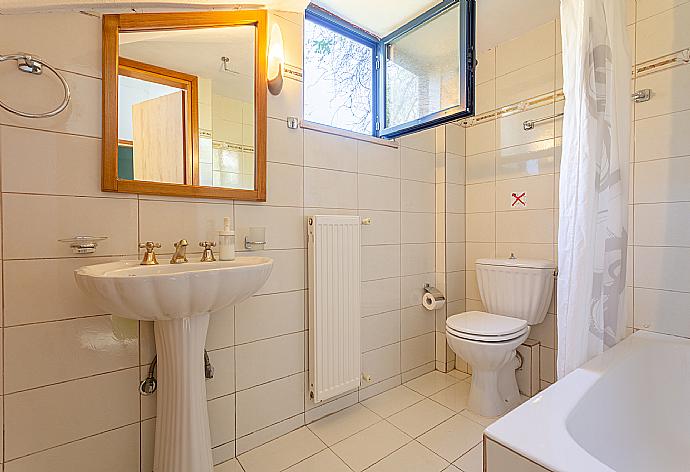 Family bathroom with bath and shower . - Villa Dimitra . (Photo Gallery) }}