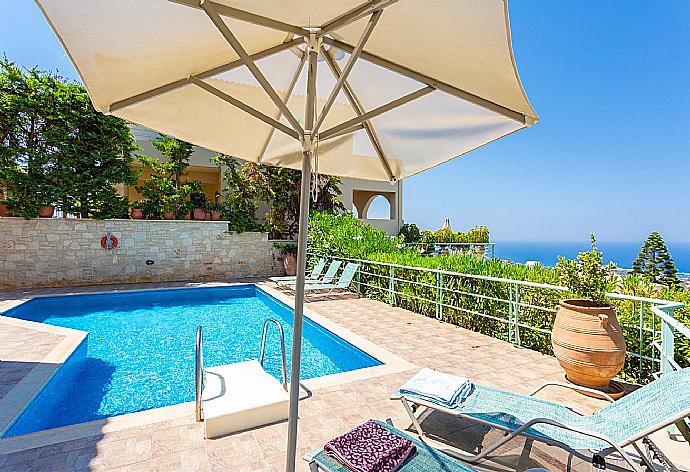 Private pool and terrace with sea views . - Villa Ilia . (Photo Gallery) }}