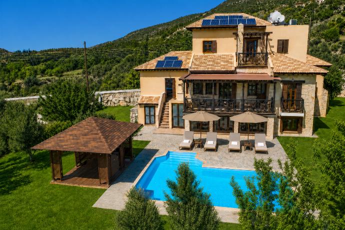 A luxurious hillside villa with a private pool, shaded gazebo, and beautiful green mountain views. . - Villa River View . (Photo Gallery) }}