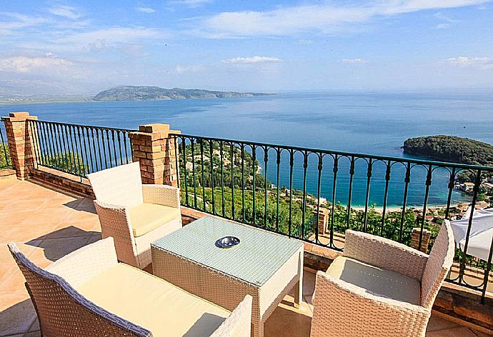 Outdoor coffee table with a beautiful sea view  . - Villa Emilios . (Photo Gallery) }}