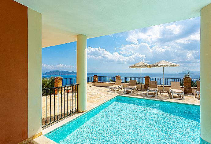 Private pool and terrace with panoramic sea views . - Villa Emilios . (Photo Gallery) }}