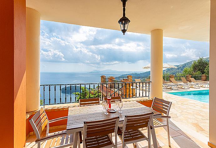 Sheltered terrace area with panoramic sea views . - Villa Emilios . (Photo Gallery) }}