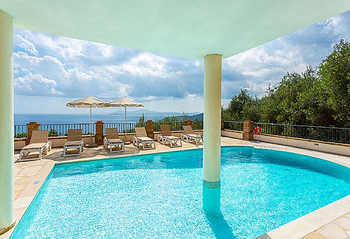 Private pool and terrace with panoramic sea views . - Villa Emilios . (Photo Gallery) }}