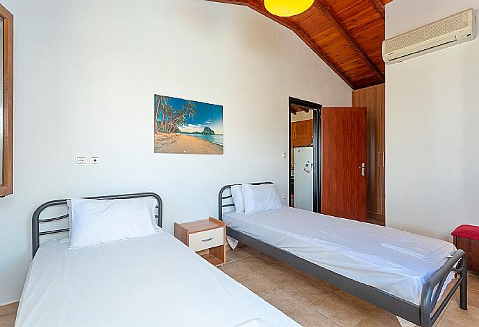 Twin bedroom with A/C and en suite bathroom . - Villa Katerina . (Photo Gallery) }}