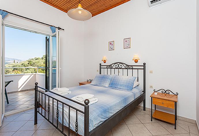 Double bedroom with A/C, and terrace access with sea views . - Alexandra . (Photo Gallery) }}