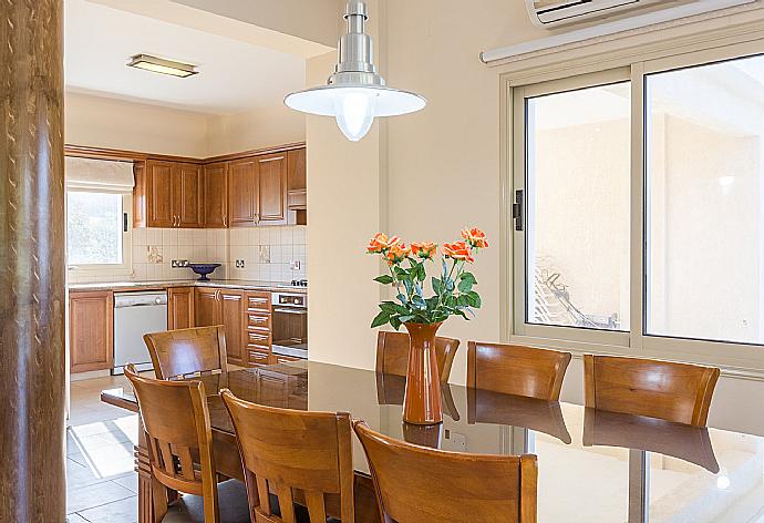 Open-plan living room with sofas, dining area, kitchen, ornamental fireplace, A/C, WiFi internet, satellite TV, DVD player, and terrace access . - Villa Clementina . (Fotogalerie) }}