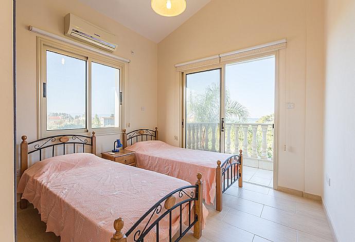 Twin bedroom with terrace access  . - Villa Clementina . (Photo Gallery) }}