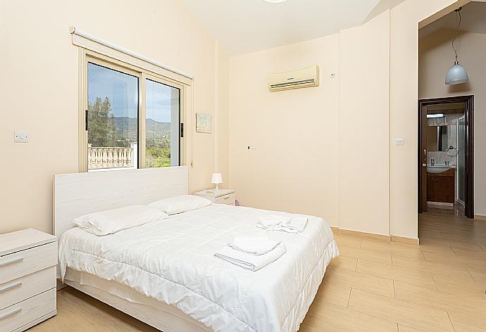 Double bedroom with en suite bathroom, A/C, sea views, and balcony access . - Villa Rose . (Photo Gallery) }}