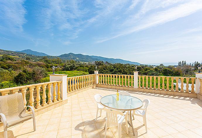 Upper terrace area with sea and countryside views . - Villa Rose . (Photo Gallery) }}