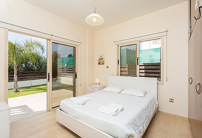 Double bedroom with A/C and terrace access . - Villa Rose . (Photo Gallery) }}