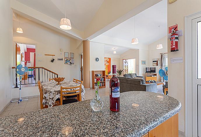 Equipped kitchen and dining area . - Villa Chrystalla . (Photo Gallery) }}