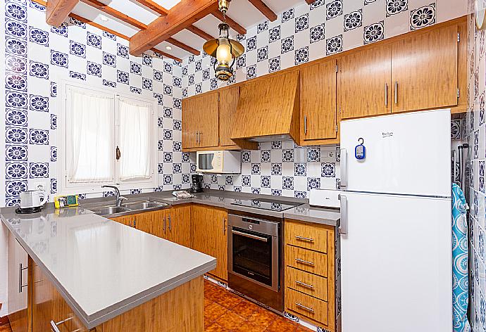 Equipped kitchen . - Voramar Waterfront . (Photo Gallery) }}