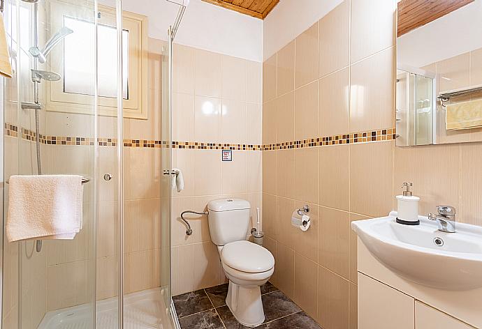 En suite bathroom with shower . - Villa Constantinos . (Photo Gallery) }}