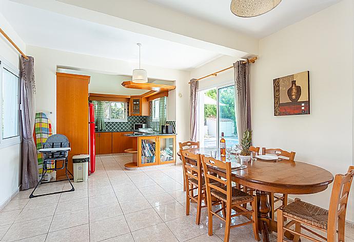 Open-plan living room with sofas, dining area, kitchen, WiFi internet, satellite TV, and terrace access . - Villa Zenon . (Galleria fotografica) }}