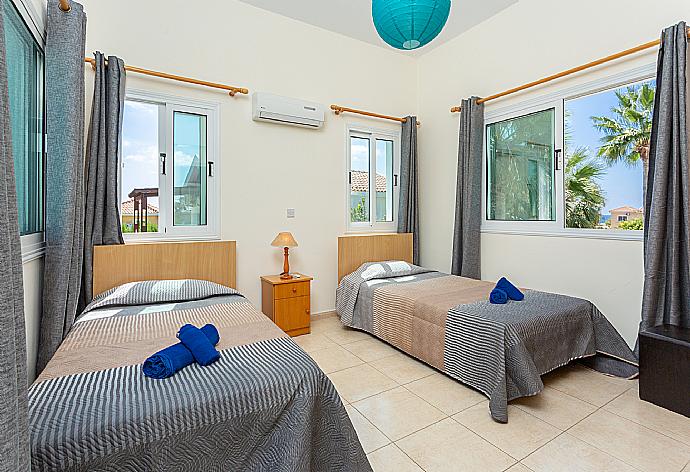 Twin bedroom with en suite bathroom, A/C, and upper terrace access . - Villa Zenon . (Galleria fotografica) }}