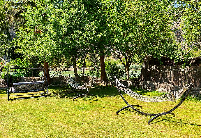 Garden at Paradise Club . - Villa Canan Paradise . (Galerie de photos) }}