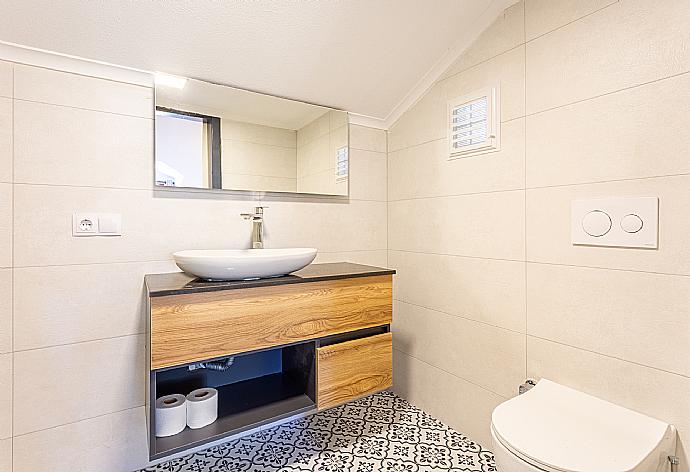 En suite bathroom with shower . - Villa Elmas Paradise . (Photo Gallery) }}