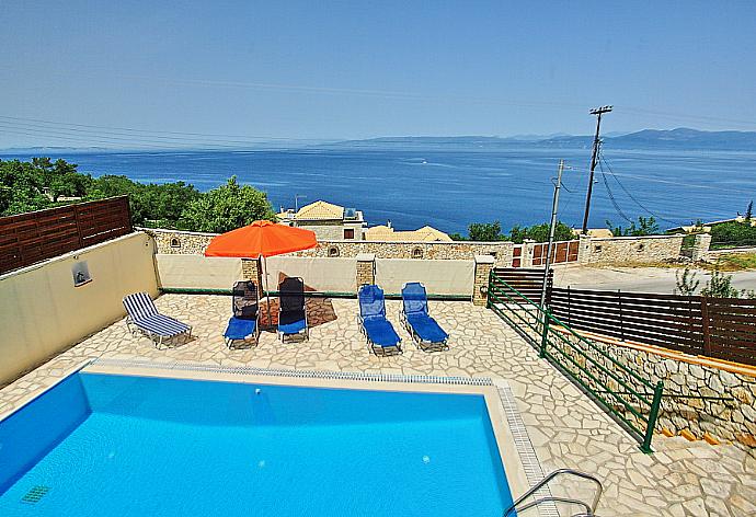 Private pool with terrace area . - Villa Martha . (Photo Gallery) }}
