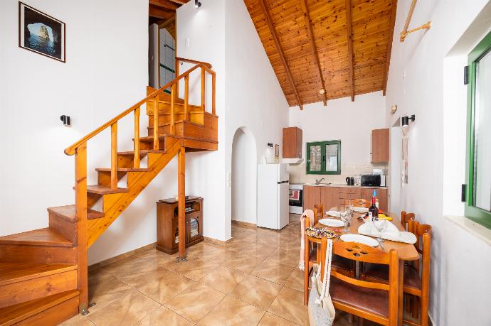 Open-plan living room with dining area, kitchen, A/C, WiFi internet, satellite TV, and sea views . - Villa Anastasia . (Photo Gallery) }}