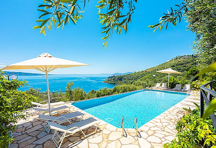Private infinity pool, terraces, and gardens with panoramic sea views . - Villa Vasso . (Photo Gallery) }}