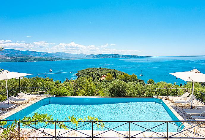 Private infinity pool, terraces, and gardens with panoramic sea views . - Villa Vasso . (Photo Gallery) }}