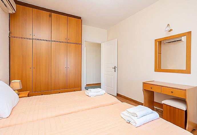 Twin bedroom with A/C and balcony access with panoramic sea views . - Villa Vasso . (Photo Gallery) }}