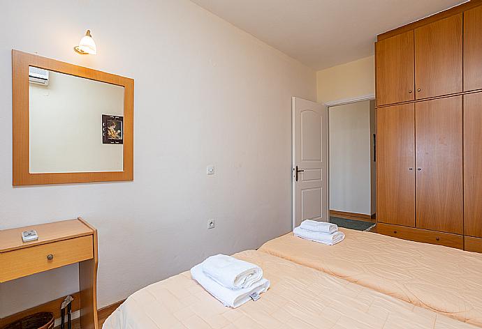 Twin bedroom with A/C and balcony access with panoramic sea views . - Villa Vasso . (Photo Gallery) }}