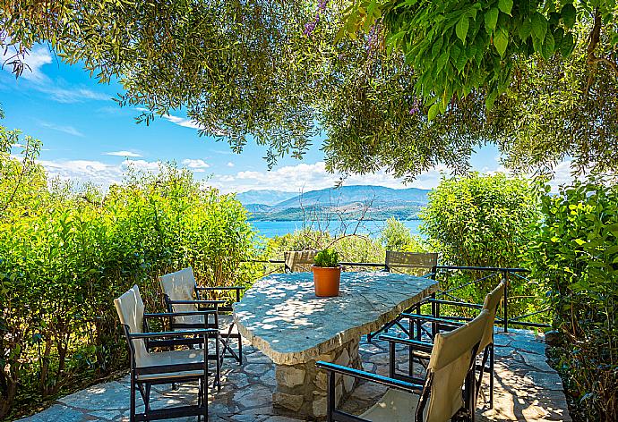 Terrace area with sea views . - Villa Vasso . (Photo Gallery) }}