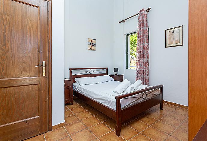 Double bedroom with A/C and balcony access . - Villa Zeus . (Photo Gallery) }}