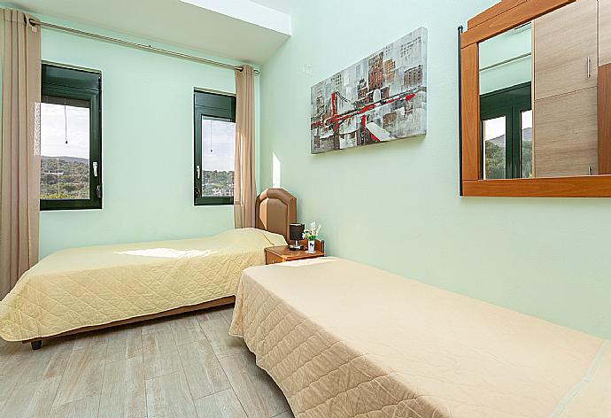 Twin bedroom with A/C . - Villa Olive . (Photo Gallery) }}