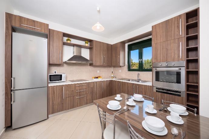 Equipped kitchen . - Villa Olive . (Photo Gallery) }}