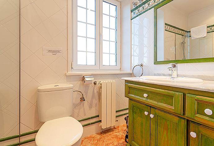 En suite bathroom with shower . - Villa Biniparrell . (Photo Gallery) }}