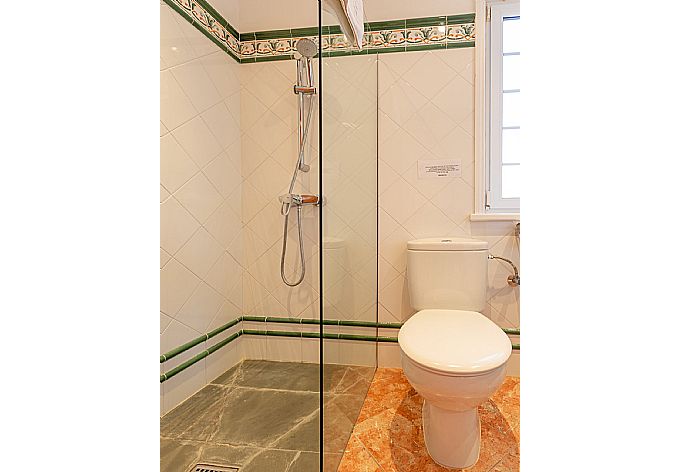 En suite bathroom with shower . - Villa Biniparrell . (Photo Gallery) }}