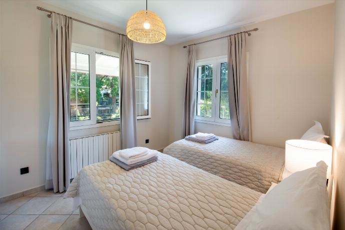 Twin bedroom with A/C . - Villa Nefeli . (Photo Gallery) }}