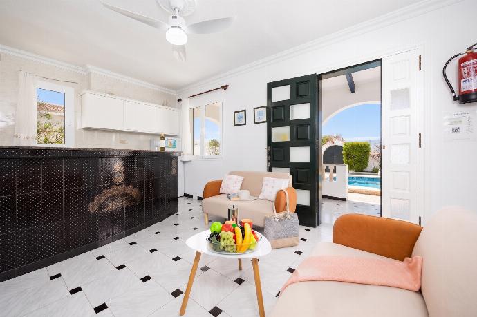 Open-plan living room with sofas, kitchen, WiFi internet, and satellite TV . - Villa Emilio . (Photo Gallery) }}