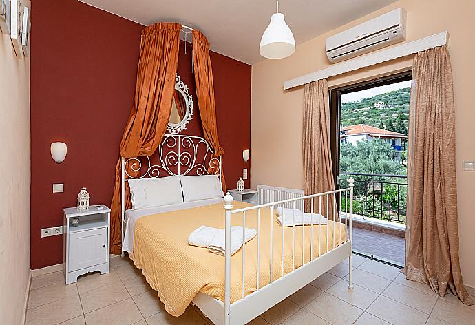 Double bedroom with A/C and balcony access . - Villa Marina . (Photo Gallery) }}