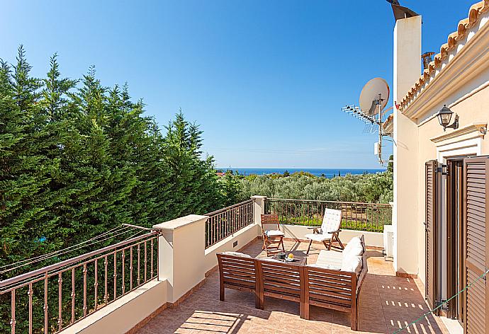 Balcony on first floor with sea views . - Villa Eufrosini . (Photo Gallery) }}