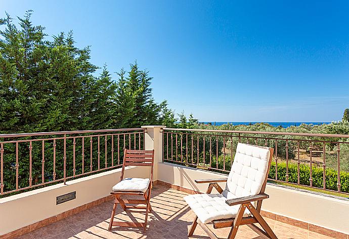 Balcony on first floor with sea views . - Villa Eufrosini . (Photo Gallery) }}