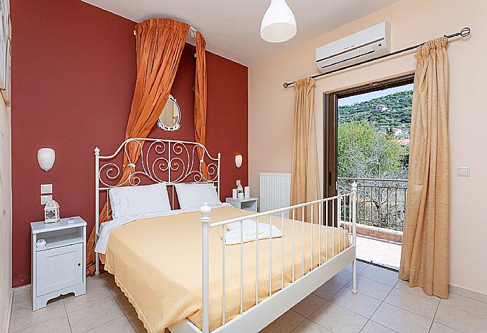 Double bedroom on first floor with A/C and balcony access . - Villa Eufrosini . (Photo Gallery) }}