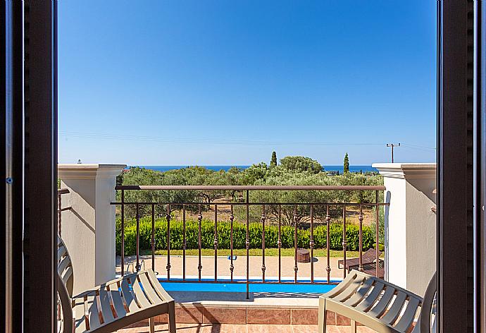 Balcony on first floor with sea views . - Villa Eufrosini . (Photo Gallery) }}