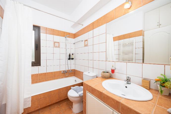 Family bathroom with bath and shower . - Villa Eufrosini . (Photo Gallery) }}