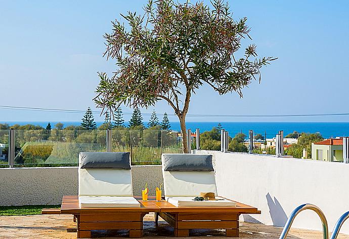 Private pool with terrace area . - Villa Thetis . (Photo Gallery) }}