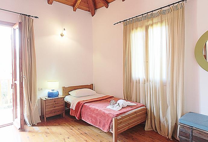 Twin bedroom with A/C with balcony access . - Villa Miguela . (Photo Gallery) }}