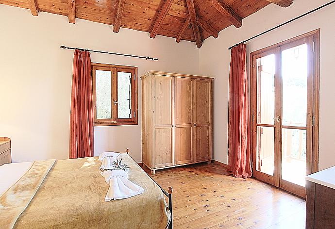 Double bedroom with A/C with balcony access . - Villa Miguela . (Photo Gallery) }}