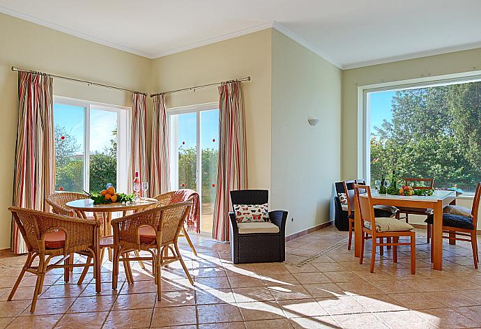 Dining area with terrace access . - Villa Tulipa . (Photo Gallery) }}