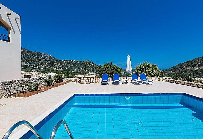 Private pool with terrace and garden area . - Villa Kostis . (Photo Gallery) }}