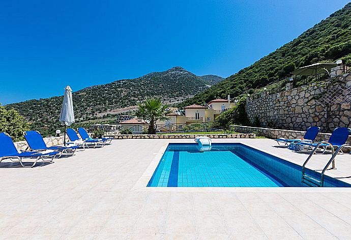 Private pool with terrace and garden area . - Villa Kostis . (Photo Gallery) }}