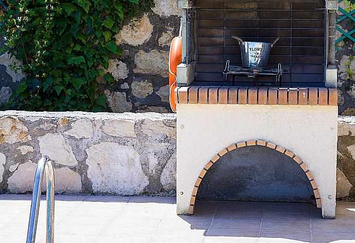 Terrace area with BBQ . - Villa Kostis . (Photo Gallery) }}