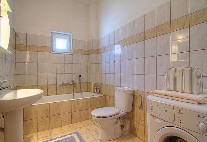 Bathroom with bath . - Villa Kostis . (Photo Gallery) }}